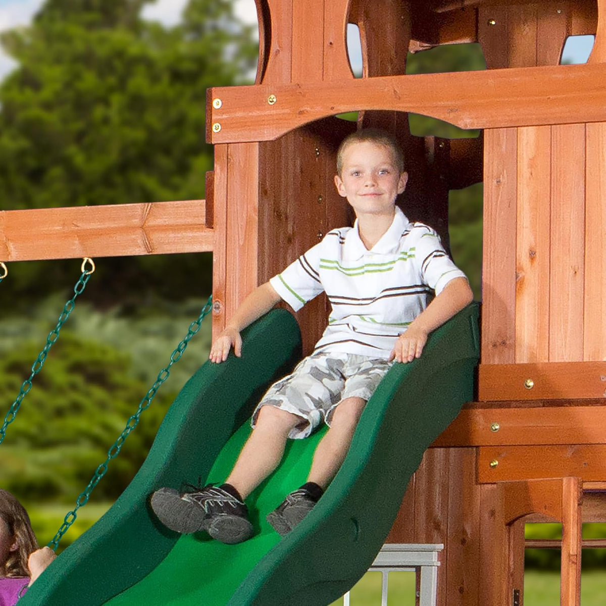 All Cedar Wooden Swing Set with 2 Belt Swings, Trapeze Bar, 10 ft Wave Slide, Playhouse, Play Kitchen, Rock Wall, Bench J9500